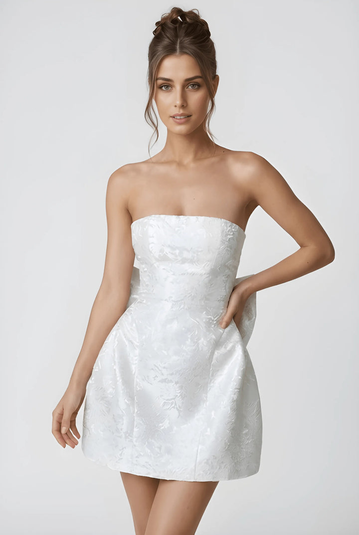 Women's Stunning Backless Mini Cocktail Dress with Jacquard Finish and Bow Detail