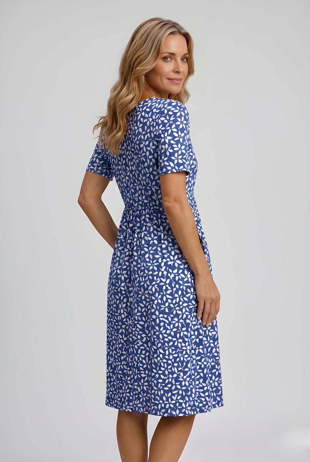 Women's Floral Short Sleeve Midi Dress with Pockets and Pleated Detail