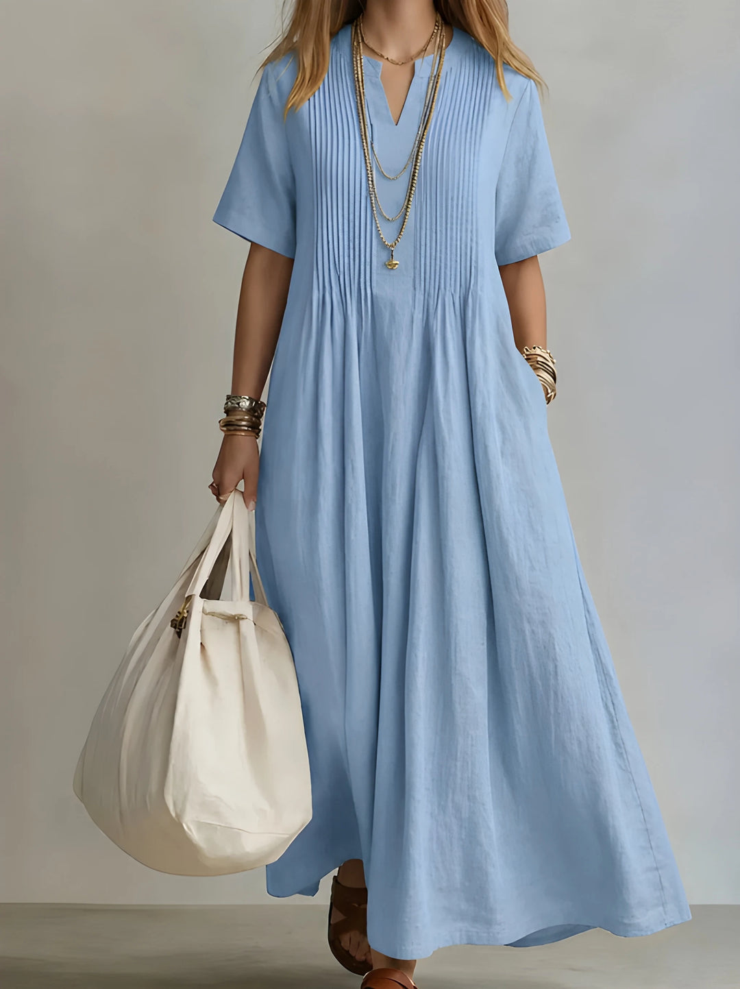 Women's Elegant Maxi Dress with Pleated Front and Pockets