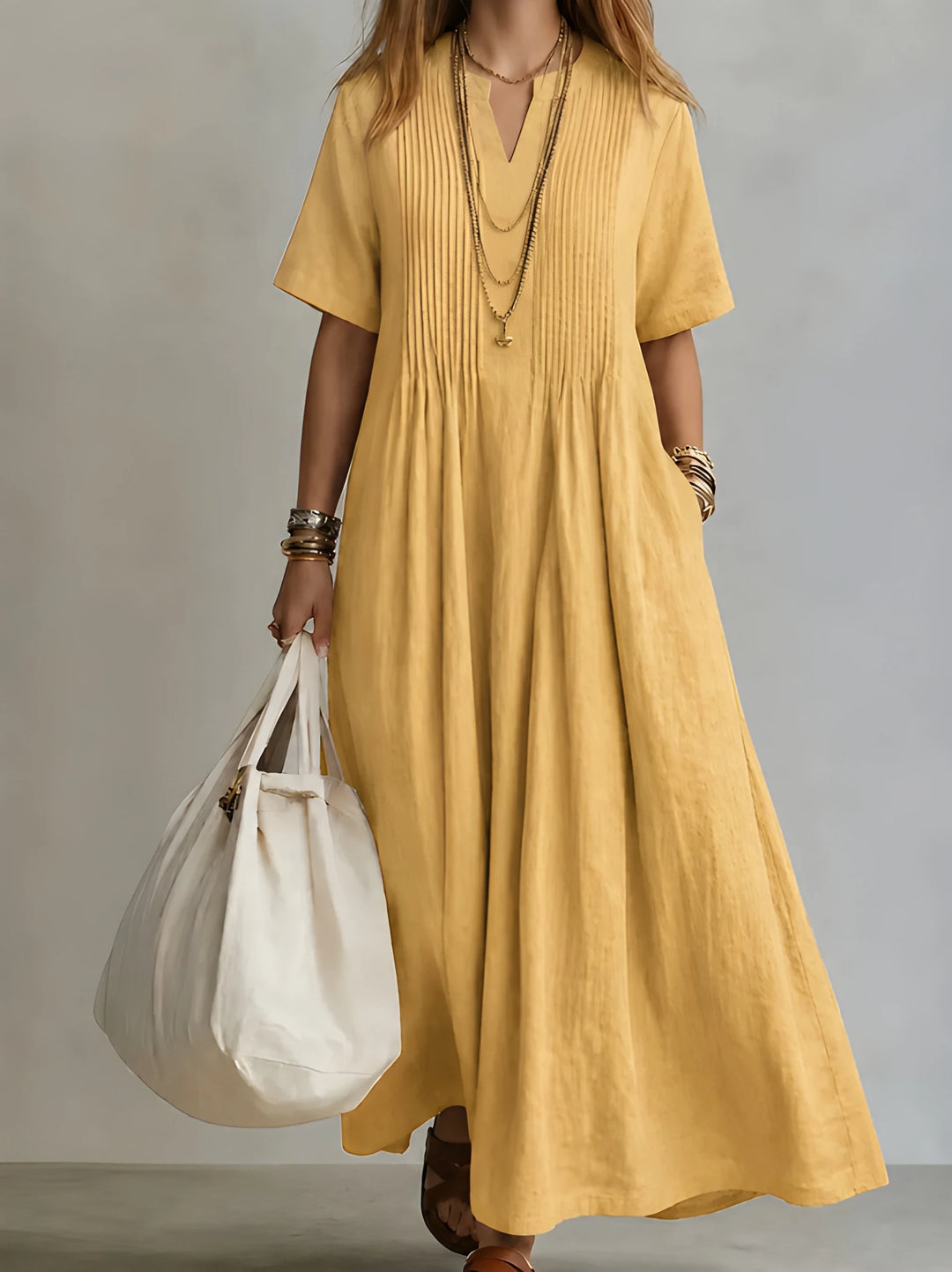 Women's Elegant Maxi Dress with Pleated Front and Pockets
