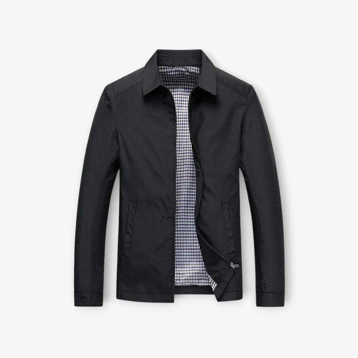 Black jacket with a checkered shirt underneath on a white background